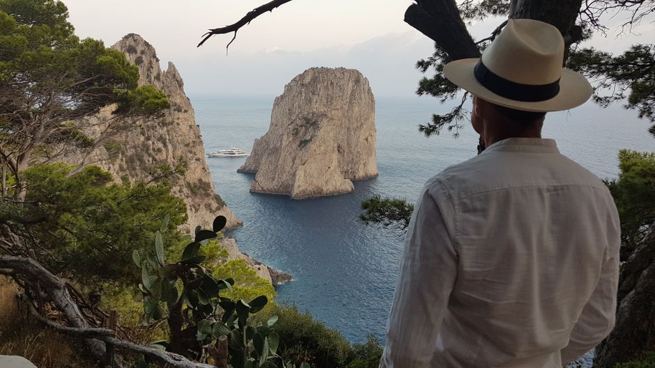 Luxury Travel Advisor Overlooking Capri Faraglioni Designing Private Yacht Itinerary